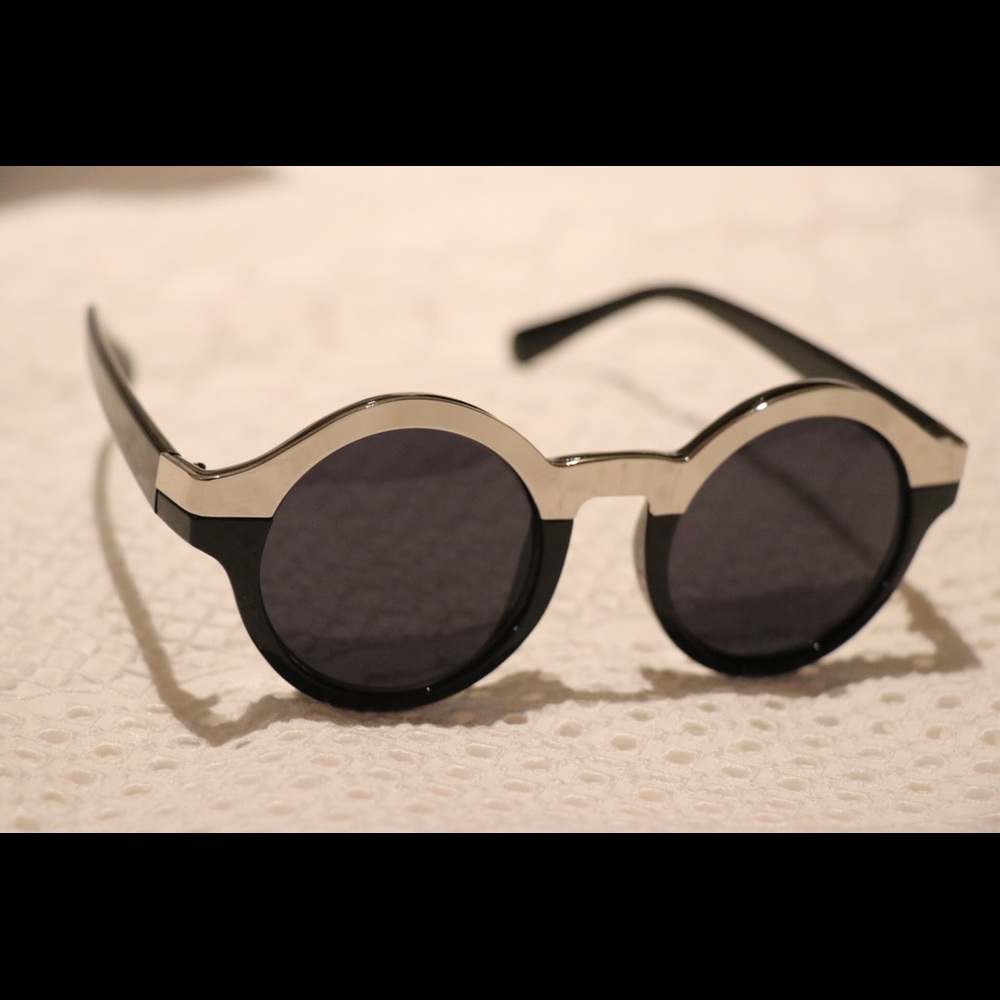 Black sunglasses with silver trim